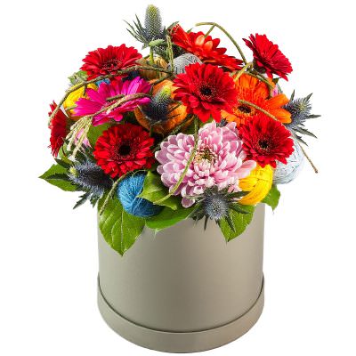 Цветочная композиция в шляпной коробке «Цветное чудо»